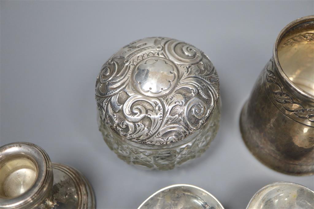 A silver Christening mug, a pair of silver seal top spoons and sundry silver,